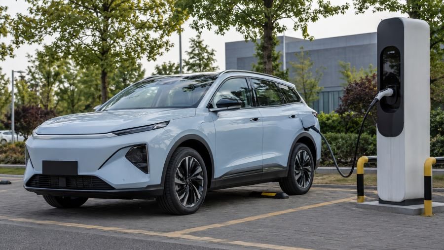 Affordable Chinese electric SUV charging at a public station
