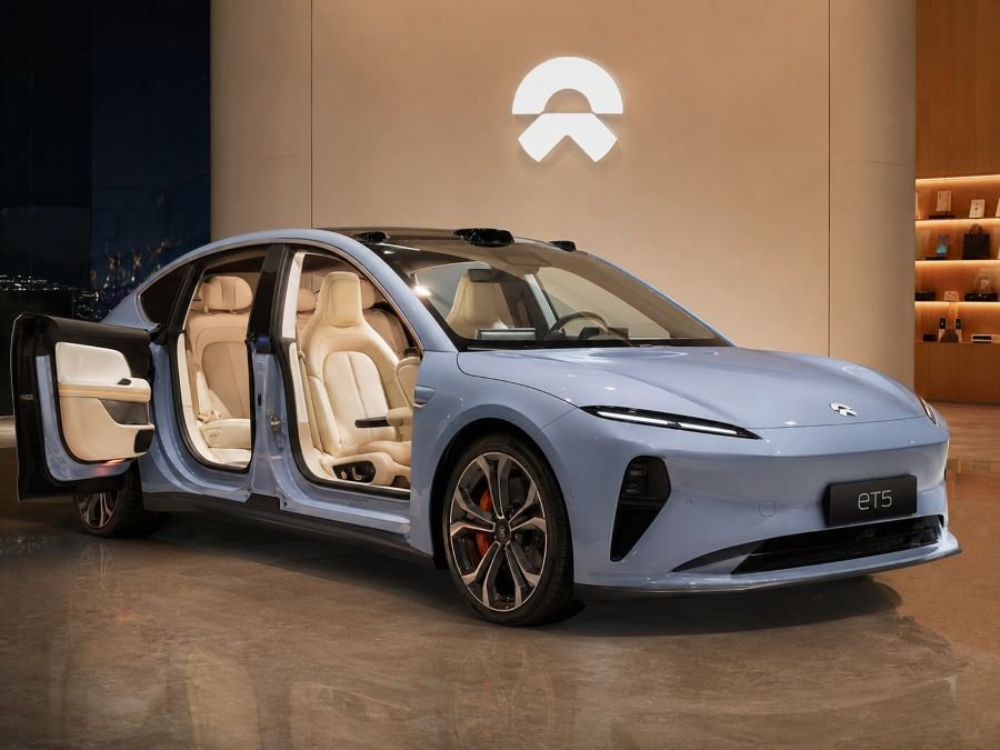 Sleek NIO ET5 sedan photographed in premium setting with minimalist interior visible