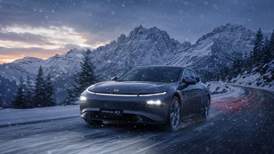 Chinese EV winter driving in snowy landscape