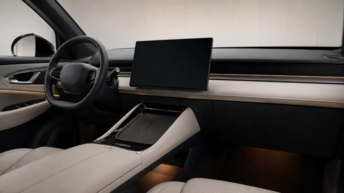 Minimalist modern SUV interior with a large central touchscreen and dual-tone leather seats
