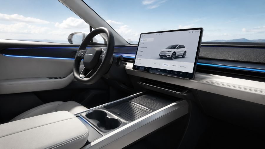 Minimalist electric SUV interior with large central touchscreen