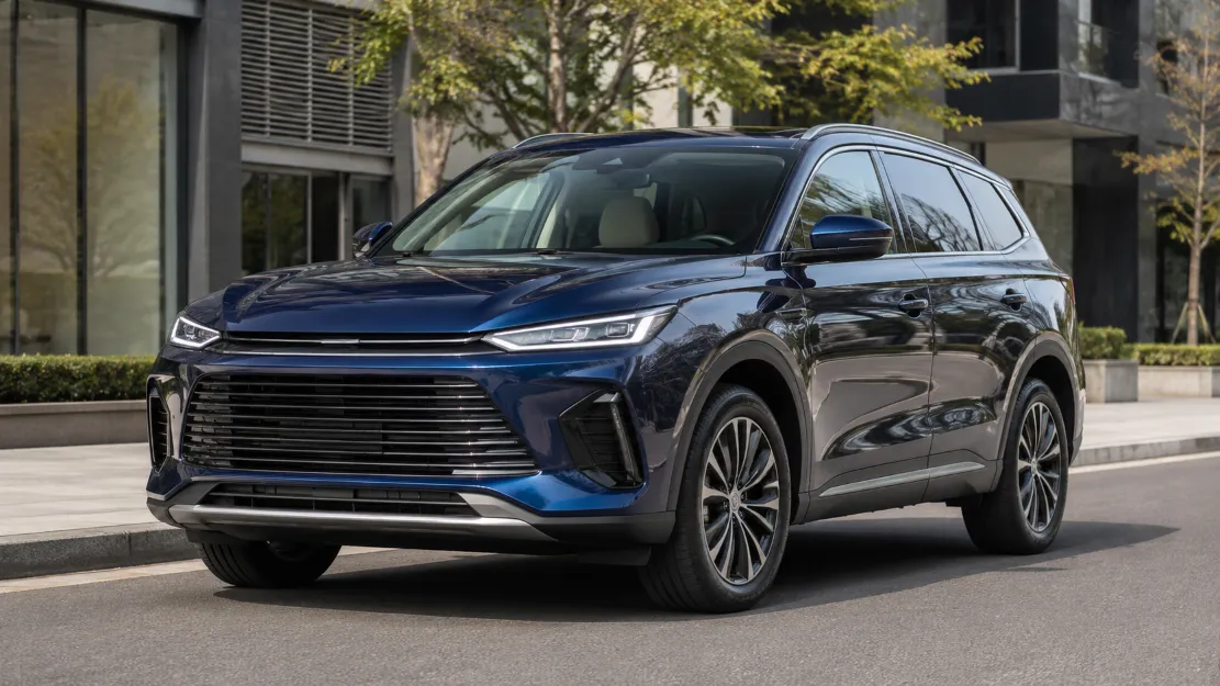 Modern blue Chinese midsize SUV photographed from the front three-quarter angle on a city street