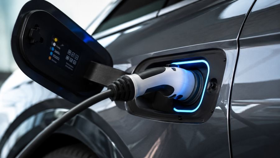 Electric vehicle fast charging port with cable connected