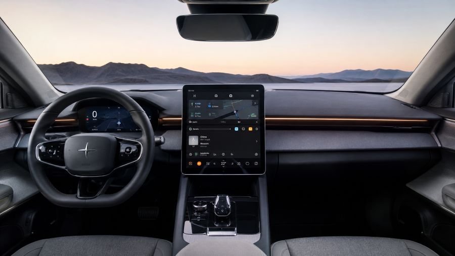 Modern electric sedan interior with large central touchscreen